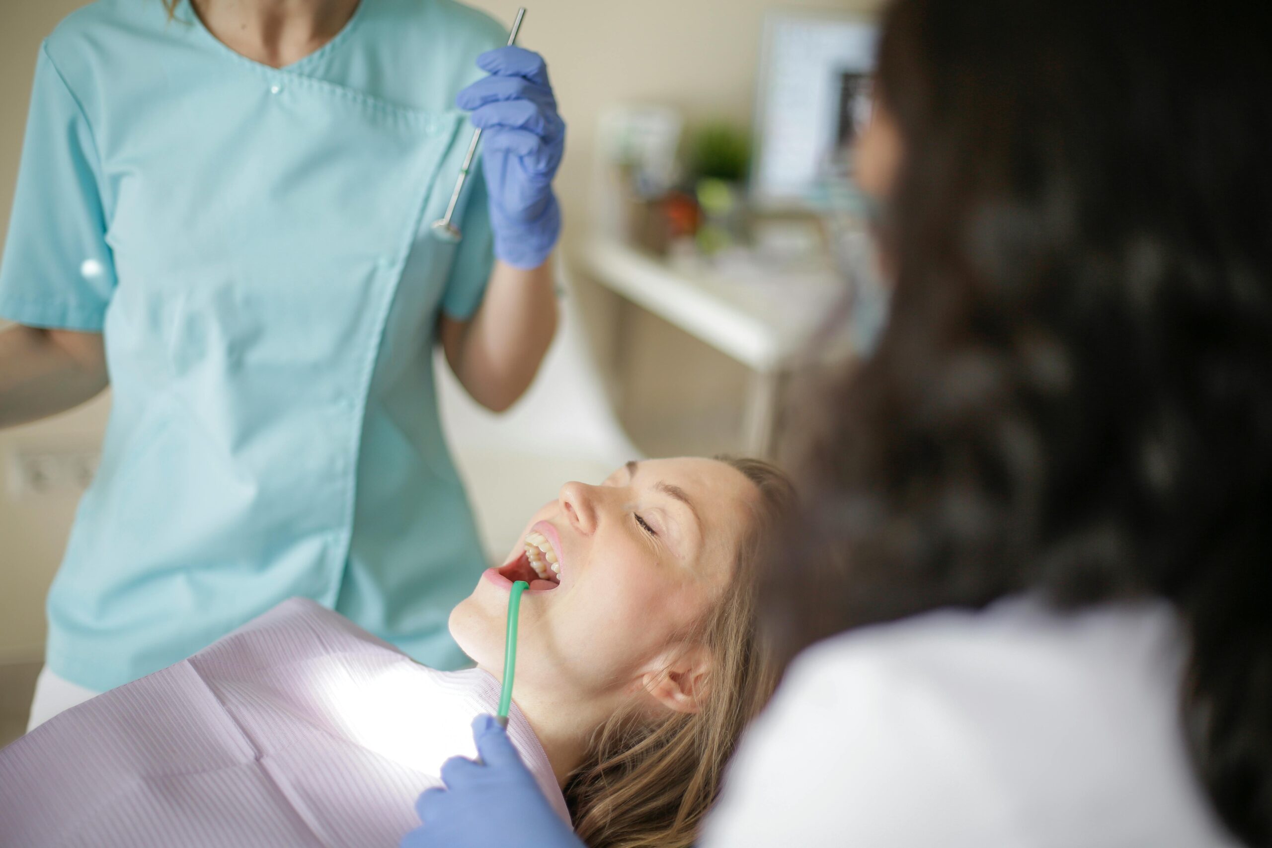 female patient relaxed while visiting our sedation dentist Missouri City, TX